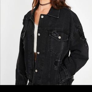 Reselling black denim jacket